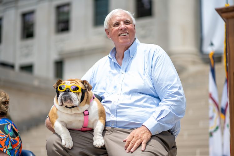 Gov. Justice Owes $158 Million, but… Look At Baby Dog!